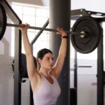 Military Press: Barbell, Dumbbell, Seated & Standing Variations for Shoulder Strength, Size, and Stability